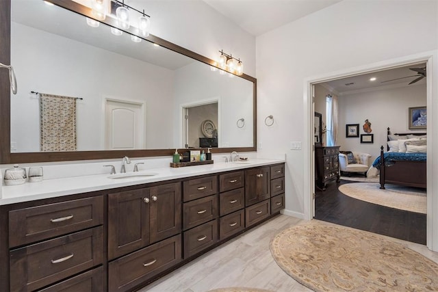 bathroom with vanity and hardwood / wood-style floors