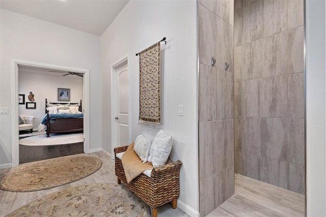 bathroom featuring a tile shower