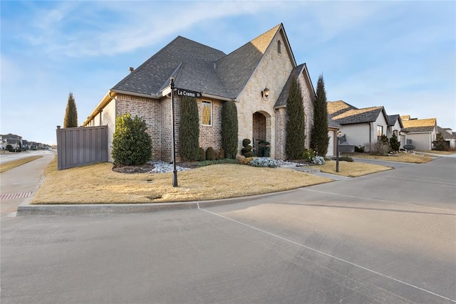 view of french country inspired facade