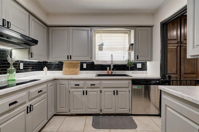 kitchen with gray cabinets, dishwasher, sink, and light tile patterned floors