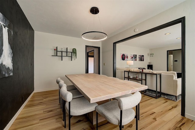 dining room featuring light wood-type flooring