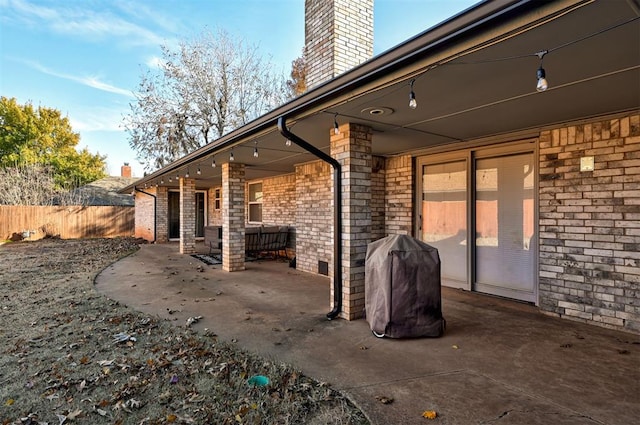 view of patio with a grill