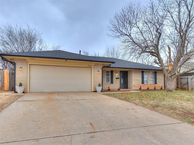 single story home featuring a garage