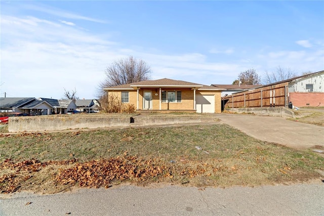 ranch-style home with a garage