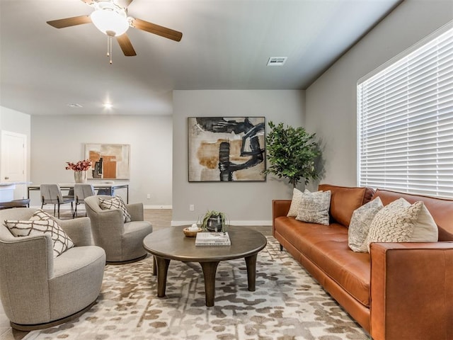 living room with ceiling fan