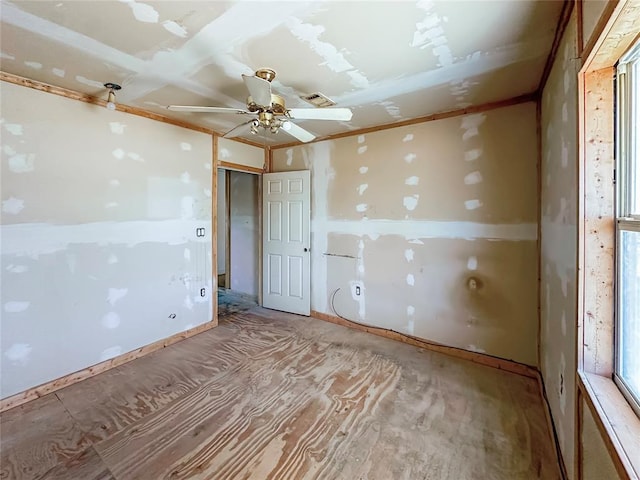 spare room with ceiling fan