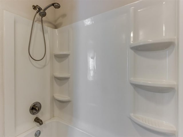 interior space with washtub / shower combination