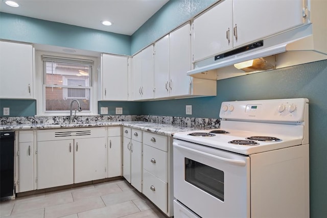 kitchen with electric range, sink, white cabinets, and light tile patterned floors