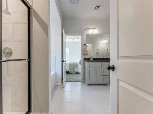 full bath featuring visible vents, ensuite bath, tile patterned floors, vanity, and a shower stall