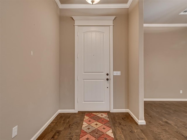 entrance foyer featuring dark hardwood / wood-style floors and ornamental molding