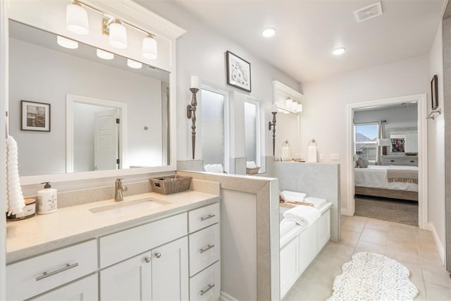 bathroom featuring tile patterned floors and vanity