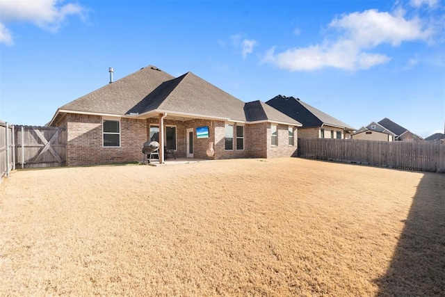 back of property featuring a patio area