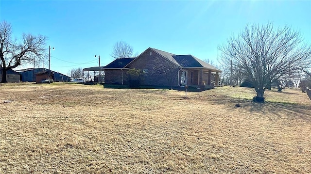 view of home's exterior featuring a lawn