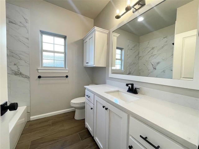 full bathroom with toilet, vanity, baseboards, shower / bathing tub combination, and wood tiled floor