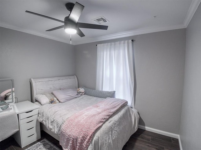 bedroom with ceiling fan and ornamental molding