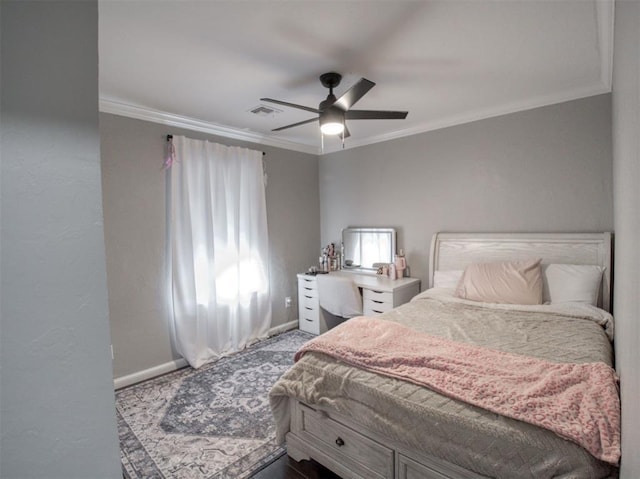 bedroom featuring ceiling fan and crown molding