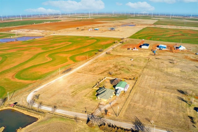 aerial view featuring a rural view and a water view