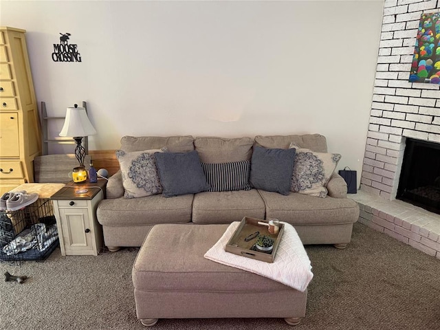 living room with carpet and a brick fireplace