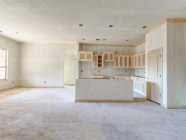 kitchen featuring a center island and ornamental molding