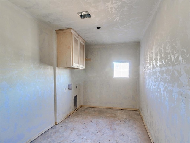 washroom with cabinets and washer hookup