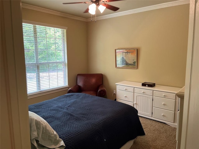 bedroom with ceiling fan, ornamental molding, and light carpet