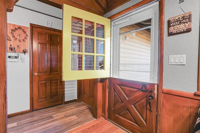 doorway to outside with light hardwood / wood-style floors