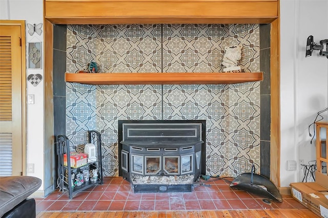 interior details featuring a wood stove