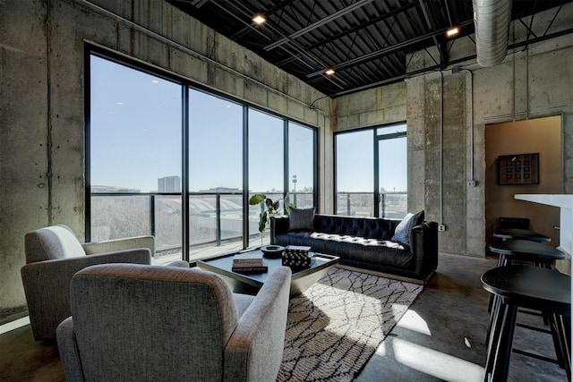 living room with concrete floors