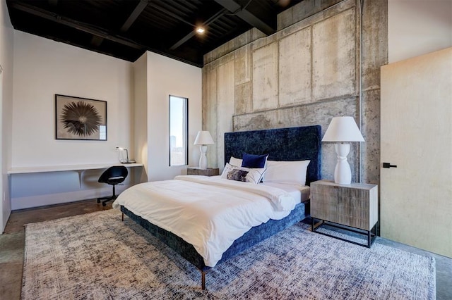 bedroom featuring beamed ceiling