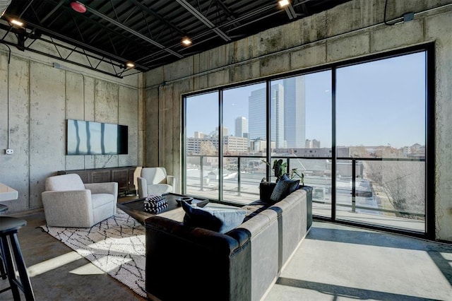 living room with concrete flooring