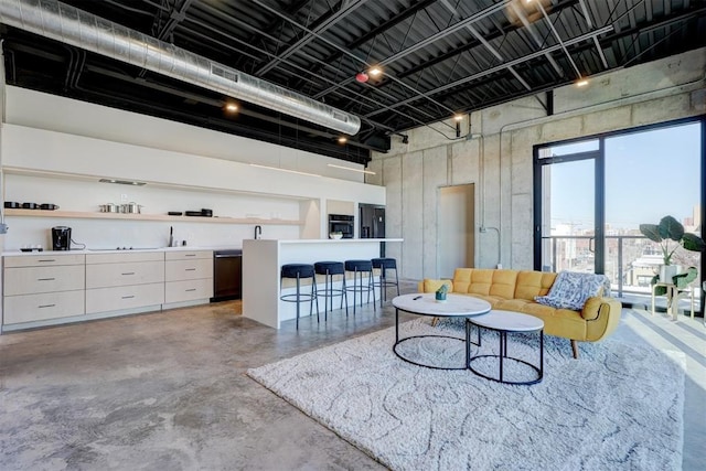 living room with concrete floors