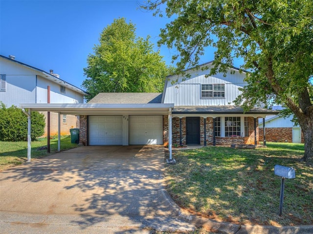 view of front facade with a front yard and a garage