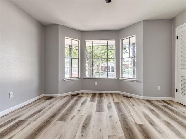 empty room featuring light wood-type flooring