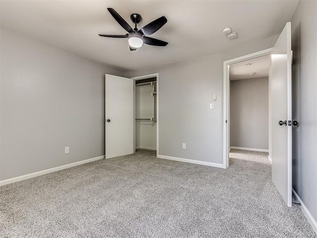 unfurnished bedroom with ceiling fan and light carpet