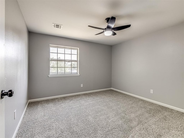 unfurnished room featuring carpet flooring and ceiling fan