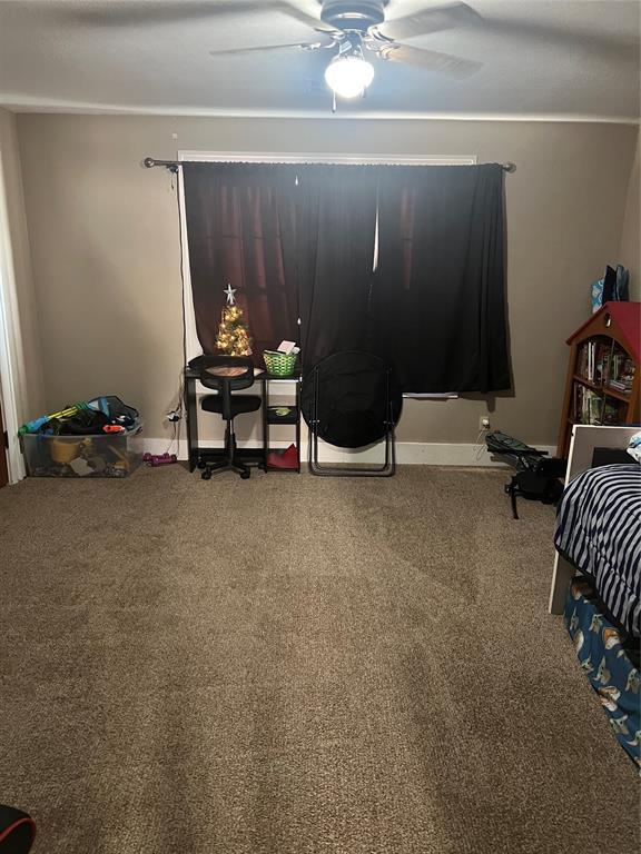 bedroom with carpet floors and ceiling fan