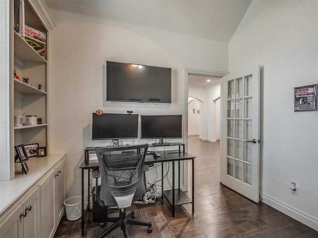 office area featuring dark hardwood / wood-style floors and lofted ceiling