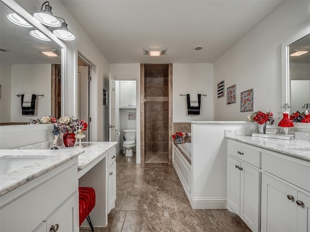 full bathroom with vanity, toilet, and independent shower and bath