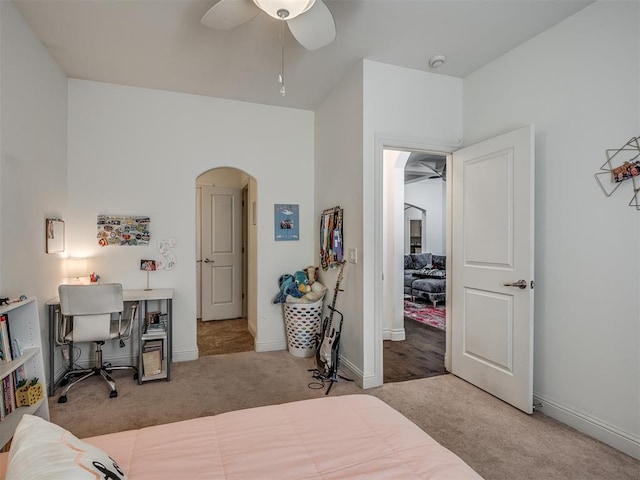 bedroom featuring ceiling fan and light colored carpet