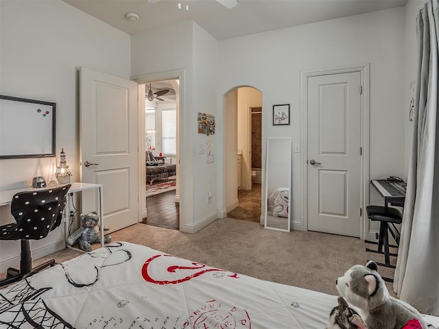 bedroom featuring light carpet