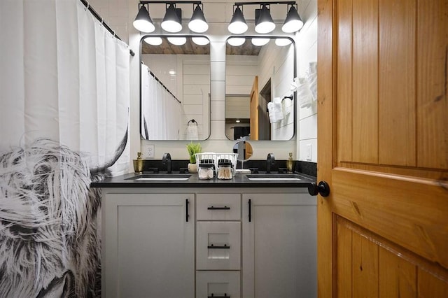 bathroom featuring vanity and walk in shower