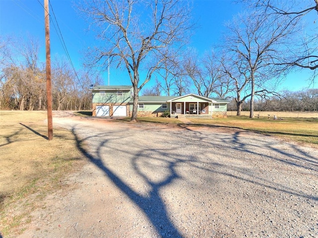 view of front of home with a front lawn and a porch