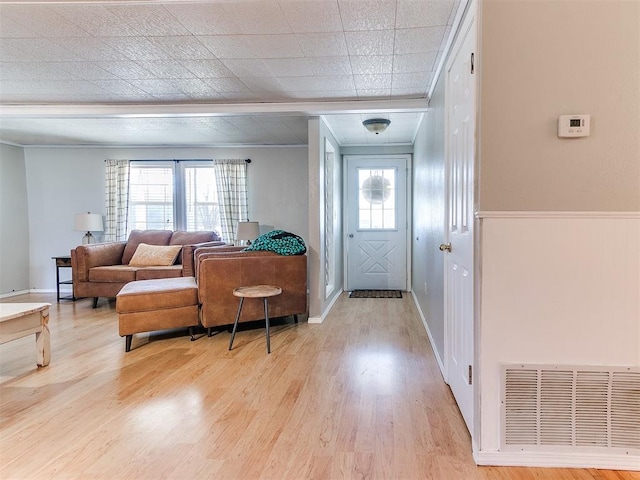 entrance foyer with light hardwood / wood-style floors