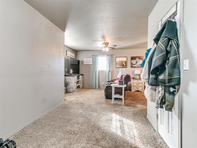 interior space featuring ceiling fan