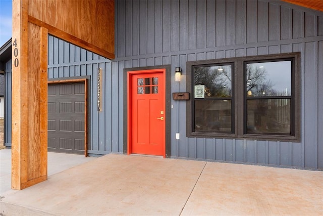 entrance to property featuring a garage