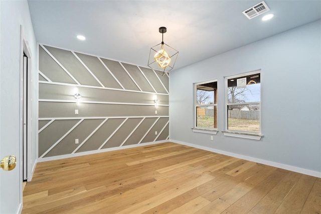 unfurnished dining area with hardwood / wood-style floors