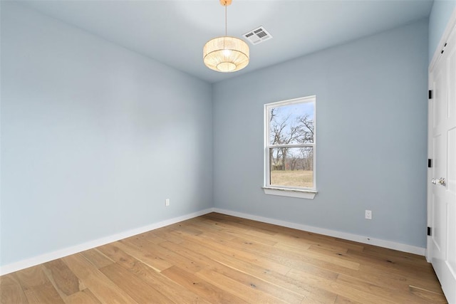 empty room with light wood-type flooring