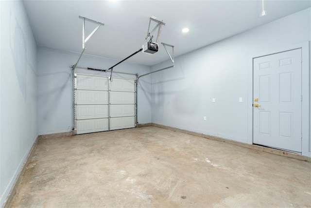 garage featuring a garage door opener