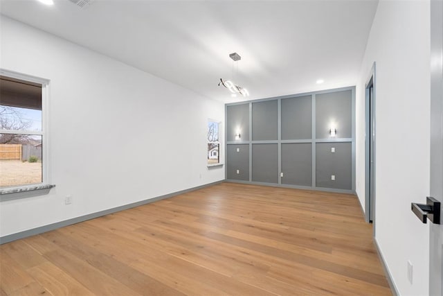 unfurnished bedroom featuring light hardwood / wood-style floors