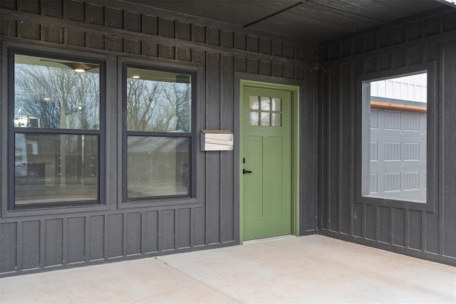 property entrance with a patio area